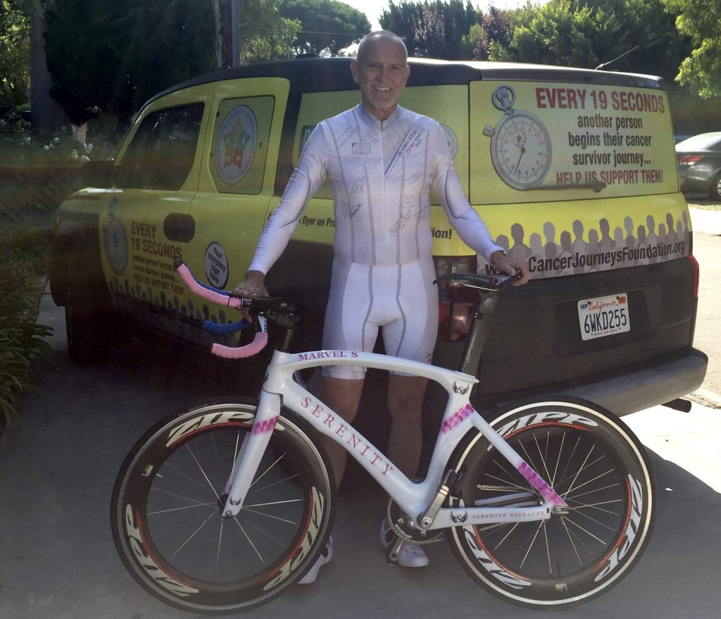 Picture of Cancer Journeys Foundation president Robert Warren Hess with Serenity Bicycle